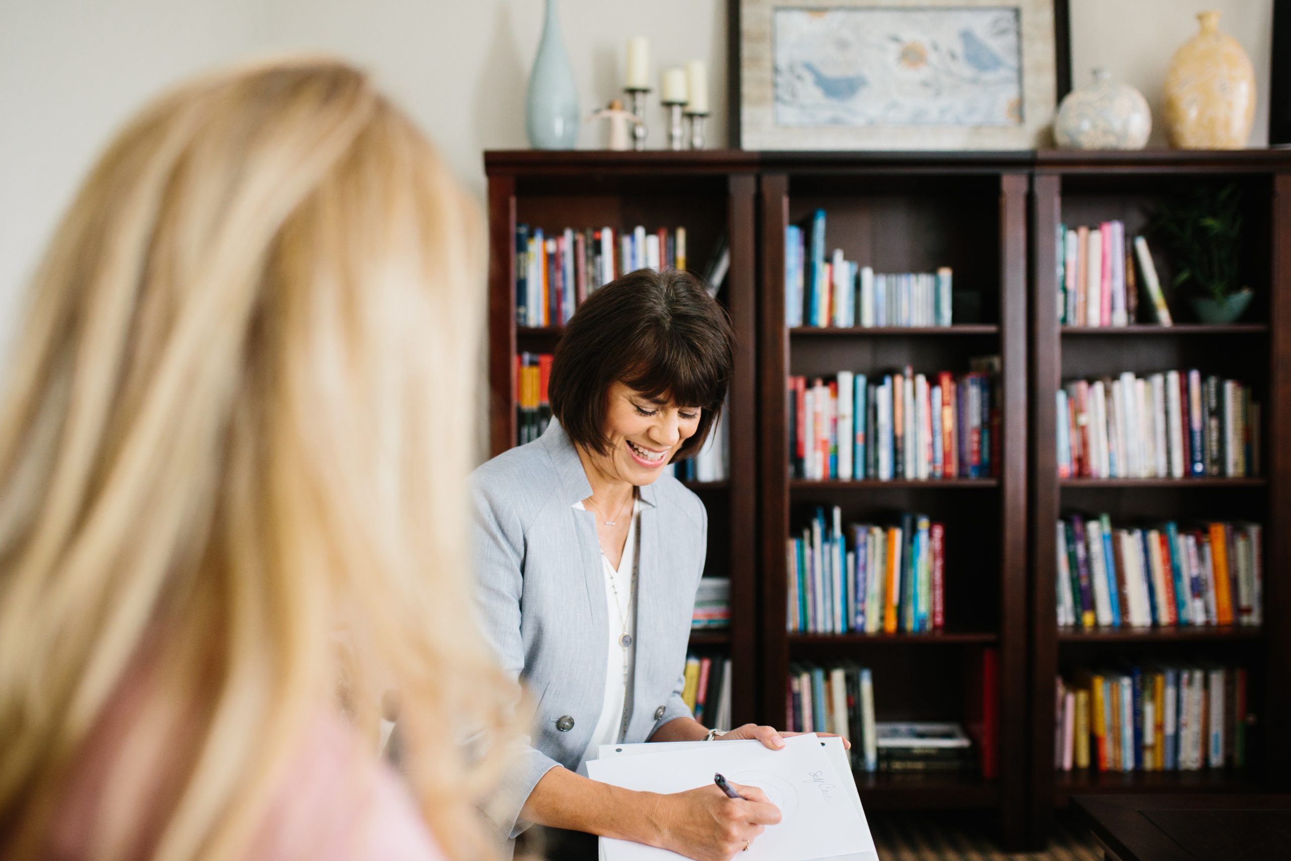 Leigh Germann working with a mother
