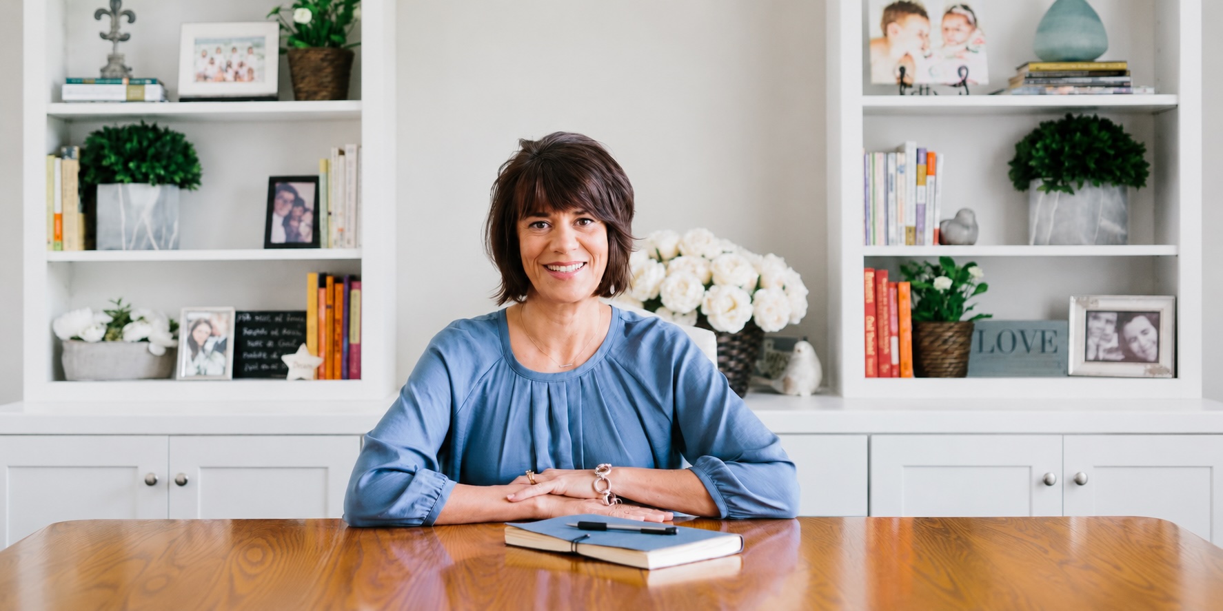 Leigh Germann at her desk